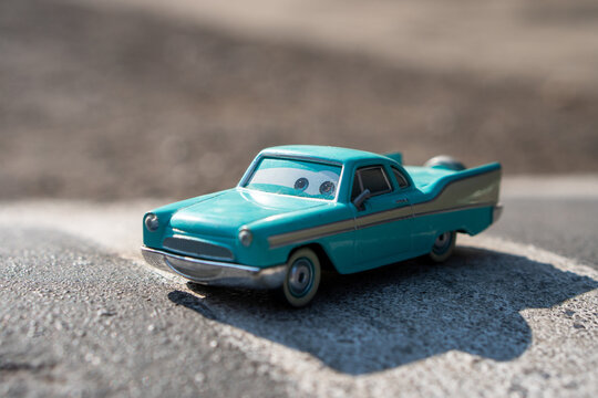 Temanggung, Indonesia, September 8, 2023 : Derek "Decals" Dobbs from Disney Pixar's Cars is turquoise and white with a distinctive retro fin design. 