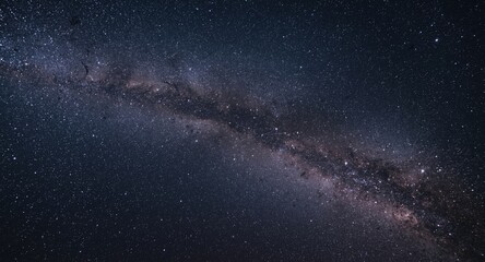 Fototapeta premium Brilliant Milky Way stretching across an infinite universe view