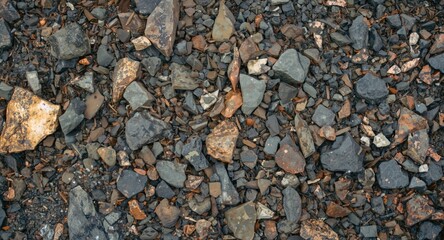 Copper mine waste accumulation with varied rock fragments