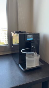 The automatic cleaning process for the cappuccino system in a modern coffee machine. Automatic cleaning of the coffee machine's milk system.