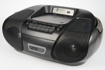 Black portable CD radio cassette player with MP3 playback isolated on white