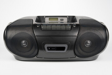 Black portable CD radio cassette player with MP3 playback isolated on white © Tsyb Oleh