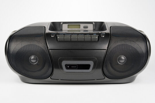 Black portable CD radio cassette player with MP3 playback isolated on white