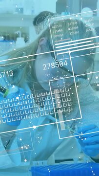 Vertical video: Lab tech selecting tip, pipetting wells for assay while HUD tracking motion