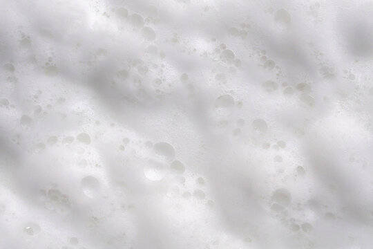 Closeup abstract white soap foam bubbles texture background