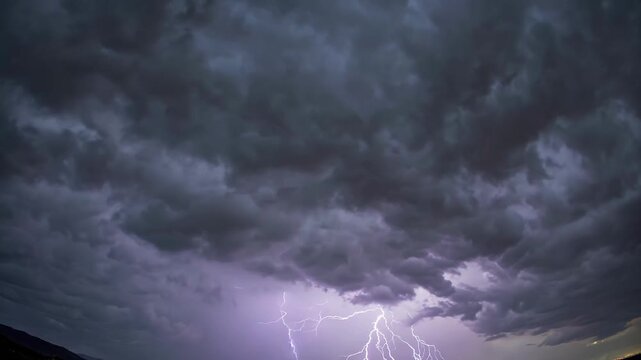 Stormy Violet Lightning. Dramatic Skies Over Turbulent Plains. Violet Lightning Cuts Through Stormy Cloud Formations. Electric Storms Illuminate Vast Horizons With Powerful Violet Flashes