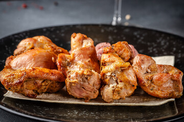 Juicy grilled chicken kebab on lavash closeup