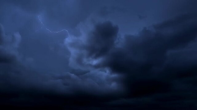 Lightning forked high intensity weather with dark stormy clouds featuring storm, tempest, cloudy sky with dramatic sky and atmospheric phenomenon