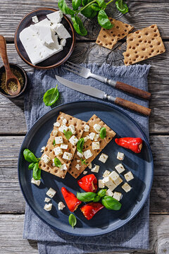 Rye crispbread open sandwich with feta and peppers