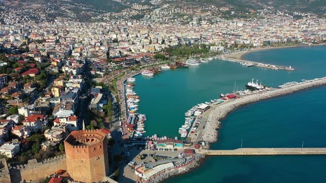 Aerial view of Red Tower (Kizil Kule), Alanya Marina and Mediterranean coast, T&uuml;rkiye. 