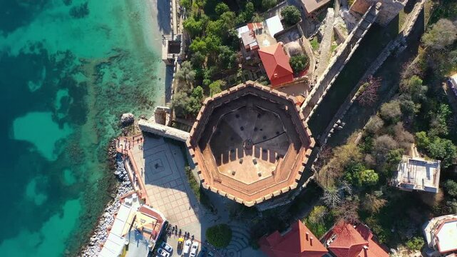 Aerial view of Red Tower (Kizil Kule), Alanya Marina and Mediterranean coast, T&uuml;rkiye. 