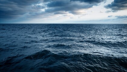 Obraz premium Overcast Day Open Ocean On The Horizon Calm Rippling Wavy Water Surface