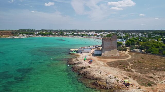Aerial view of Torre Sant'Isidoro watchtower and beach in Nardo, Puglia, Italy.