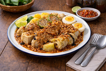 Indonesian Siomay Bandung with Peanut Sauce &ndash; Traditional Street Food Dumplings on Enamel Plate