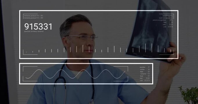 Doctor looking monitor causing transparent overlay updating codes holding X-ray film analyzing data