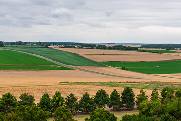 Naklejka premium Farms and fields around the road between Villers-Bretonneux and Fouilloy, Hauts-de-France, France, in July, 2011.