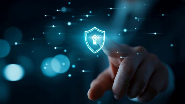 Hand taps glowing shield icon. Fingertip connects to digital security symbol. Light pulses suggest data protection. Professional posture conveys trust