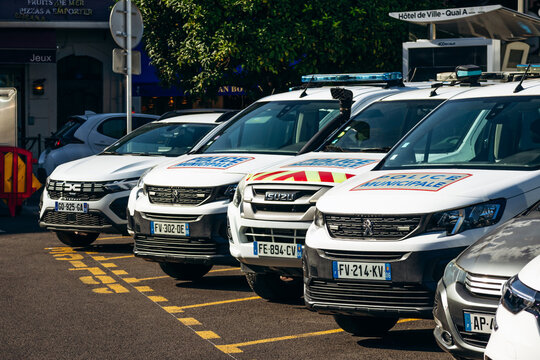 Cannes, France - September 15, 2025: Line of Police Municipale patrol vehicles parked in the center of Cannes near Place Leclerc on the French Riviera