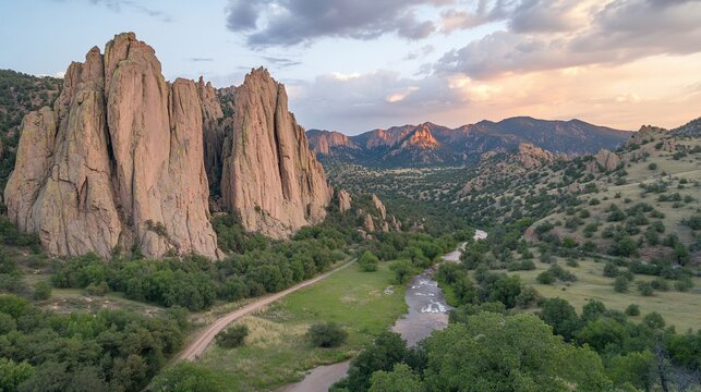 Sunset aerial view of canyon, river, and mountains