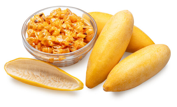 Curuba or banana passion fruits and glass bowl with curuba juicy pulp and black seeds on white background. File contains clipping paths.