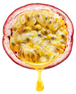 Half of passion fruit showing juicy pulp and seeds with a falling drop of juice, isolated on white background with clipping path.