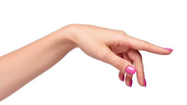 Isolated elegant female hand with bright pink polished nails pointing gesture