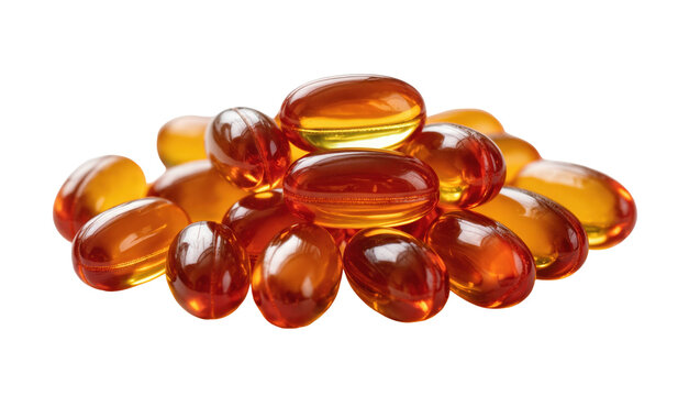 Isolated pile of shiny amber softgel capsules, commonly fish oil or vitamin D supplements.