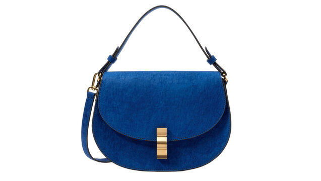 Isolated stylish royal blue suede women's handbag with elegant gold clasp and shoulder strap