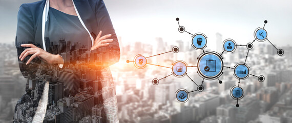 A confident businesswoman stands against a modern cityscape, surrounded by digital connection icons that represent innovation and technology in the corporate world. Tessel © InfiniteFlow