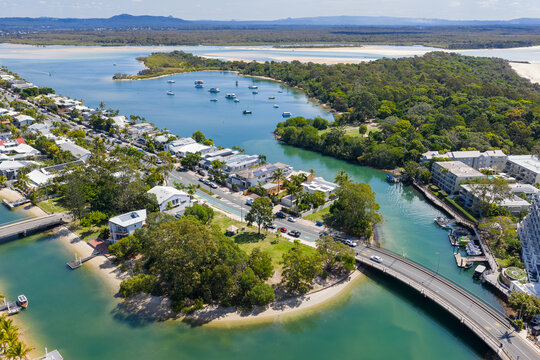 Aerial view of waterfront properties and jetties along coastal canals