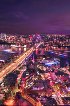 Vivid night scene over harbour bridge