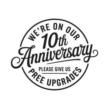 A black and white circular badge celebrating a tenth anniversary milestone