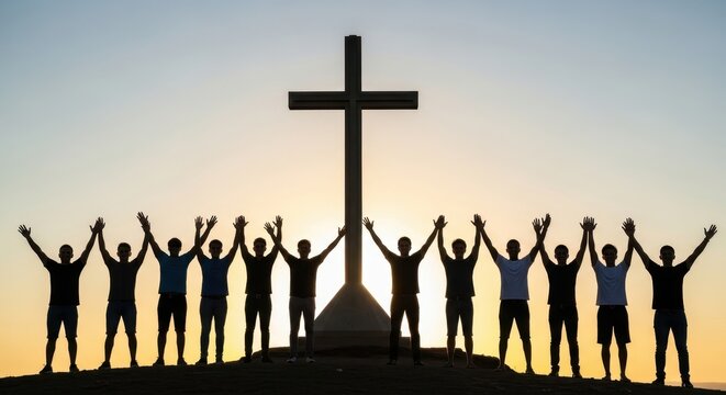 A group of people standing together with their arms raised high in front of a large wooden cross