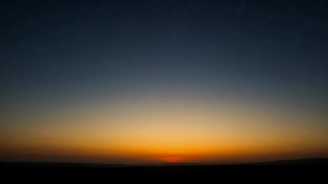 Serene sunset sky with a gradient of colors and distant stars shining