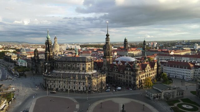 Curving flight around Semperoper beside the bridge at sunset
