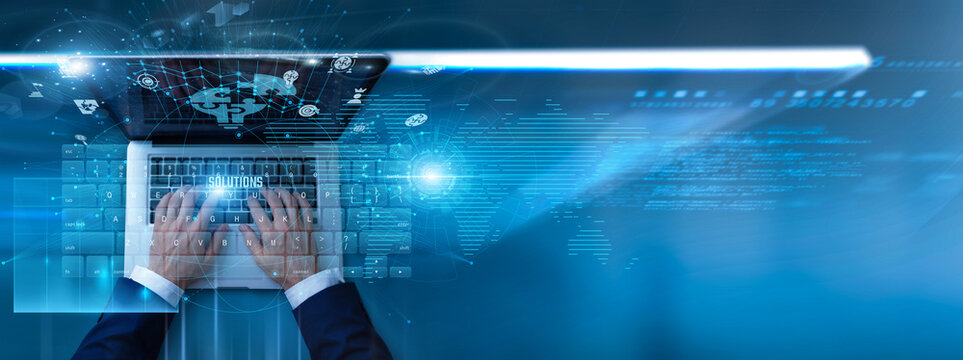 Businessman using laptop with solutions platform on keyboard and analyzing business strategies, problem-solving data, process optimization, workflow efficiency, and digital transformation outcomes.