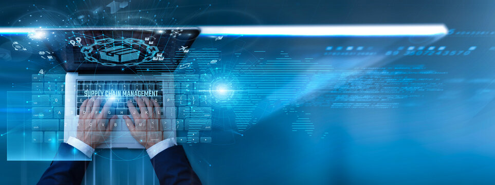Manager using laptop with supply chain management software on keyboard and analyzing inventory, logistics, supplier data, transportation efficiency, and streamlined distribution processes.