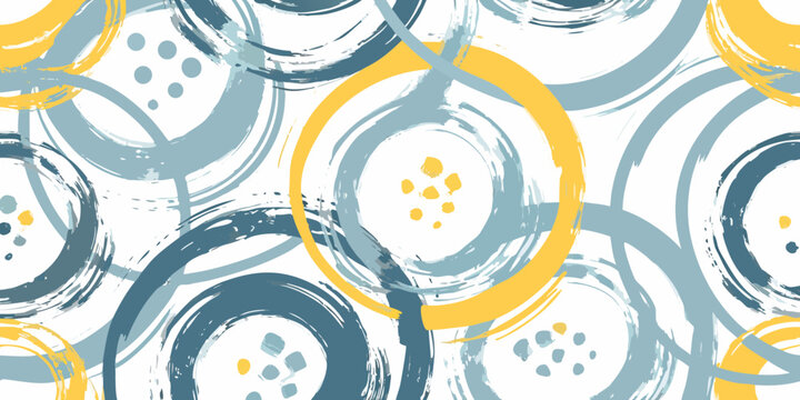 Abstract pattern of overlapping circles in yellow gray and black