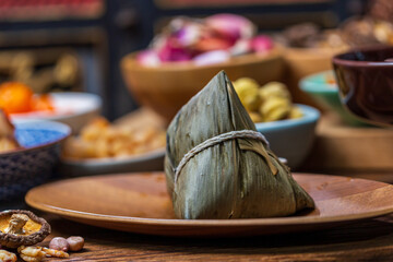 Fototapeta premium Traditional handmade meat dumplings and a variety of ingredients for the Dragon Boat Festival
