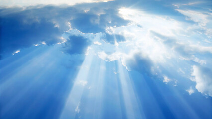 Obraz premium Dramatic blue sky with sun rays shining through fluffy white clouds