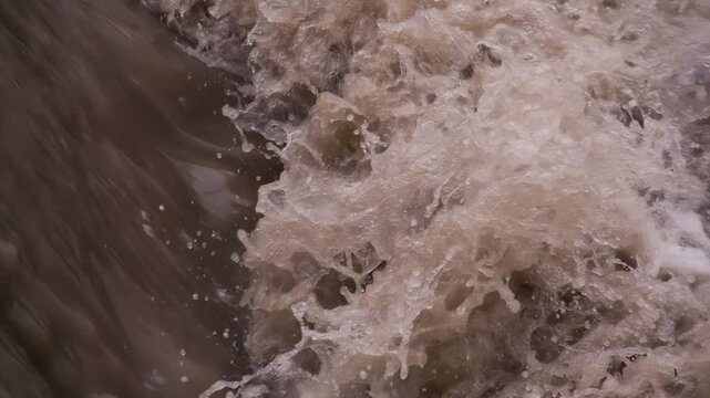 Catastrophic Floods. Powerful streams of dirty water after heavy rain. Slow Motion