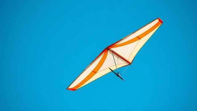 ultralight. A colorful ultralight aircraft wing extended against a clear blue sky. mobility guides, transit brochures, designed for mobility and urban transit guides.

