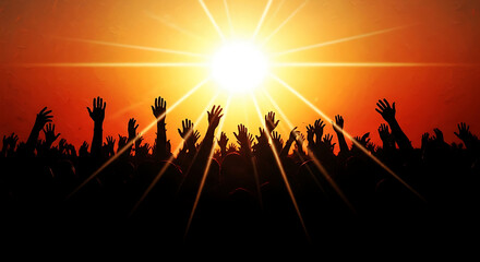 Fototapeta premium Silhouette of a crowd of people with raised hands against a vibrant sunset with a bright sun