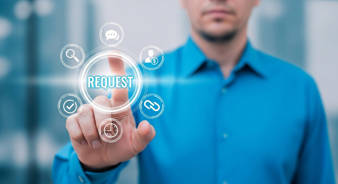 A man in a blue shirt is touching a request button with his finger