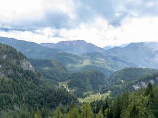 Fototapeta premium Aerial View of the Austrian Alps in Near Grundlsee With Alpine Forests on a Overcast Day
