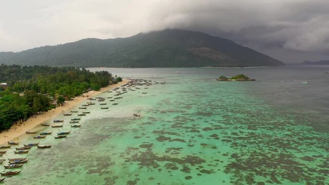 Aerial View of Koh Lipe Island with Koh Adang in Background and Longtail Boats on Shore