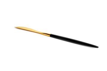 Fototapeta premium Golden knife isolated on a white background. High quality photo