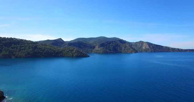 aerial Mediterranean bays and beaches sea side and pine forest scenery fethiye turkey