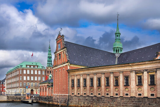 Tower of the Church of Holmen in Copenhagen, Denmark. Historic naval church architecture with no people. Narrow canal view.