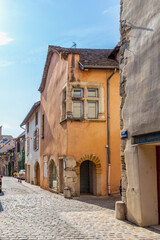 Medieval street, Crémieu, Ain department,  France. The town offers traditional architecture with its narrow medieval streets and houses since XIIe century. © Pi-R